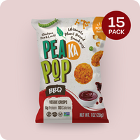 Pea Ka Pop BBQ veggie crisps packaging with 15 pack indicator on a light pink background